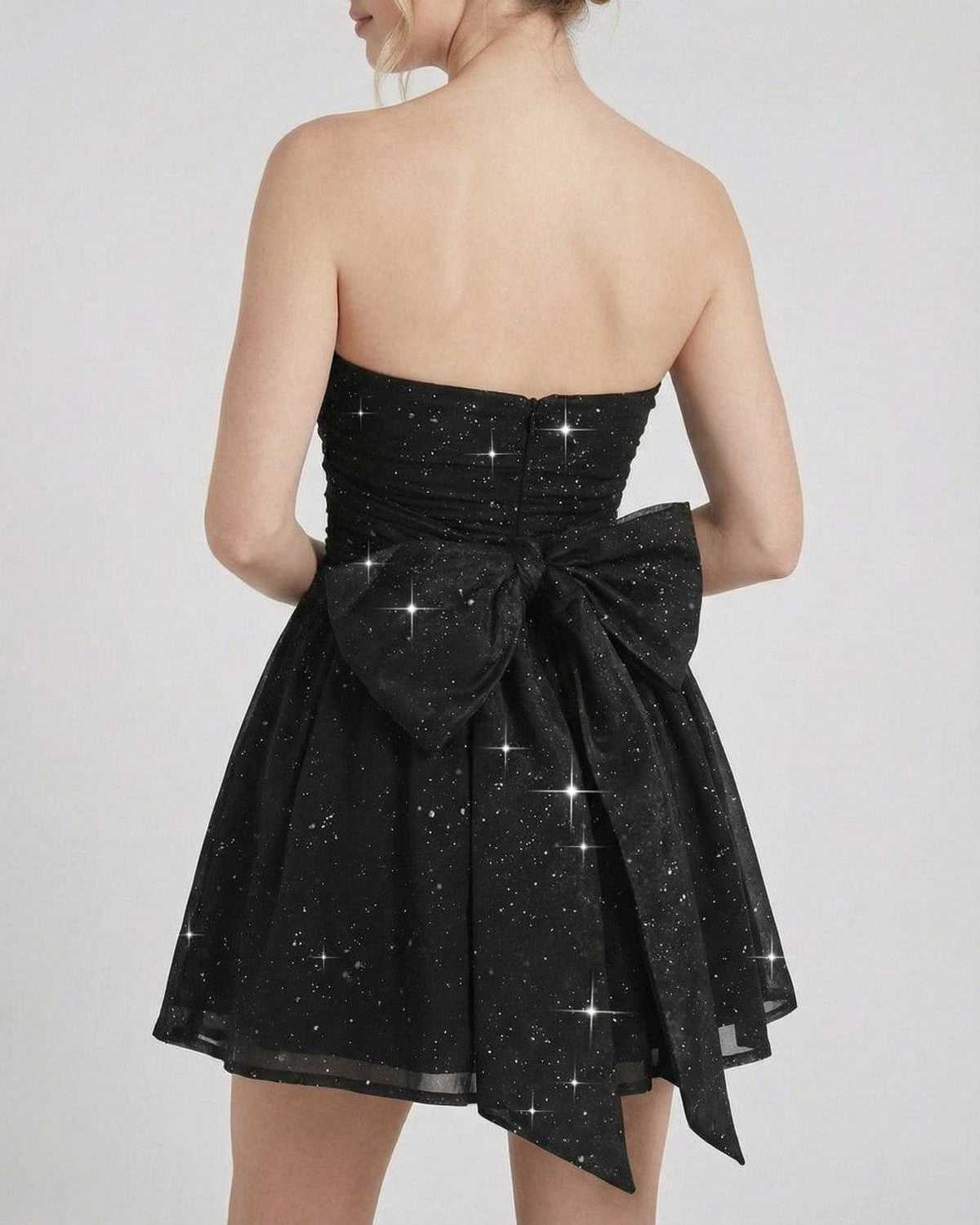 Lyra Mini Dress by Lauven, black strapless A-line mini dress with a bow detail, showcasing a shimmering finish.