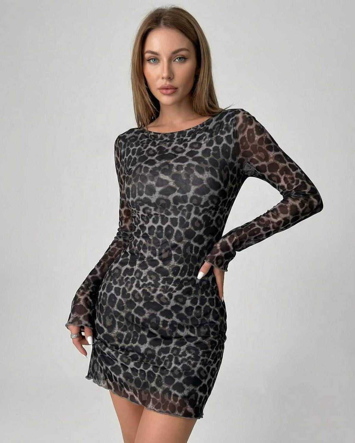 Lyra Mini Dress by Lauven featuring a chic leopard print mesh design and flattering long sleeves.