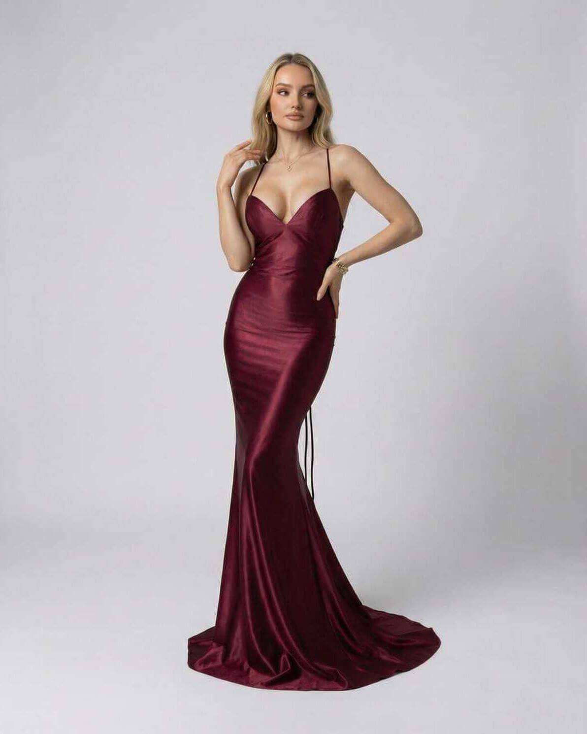 Marcelline Maxi Dress by Lauven - Luxurious burgundy satin evening gown with deep V-neckline and spaghetti straps.