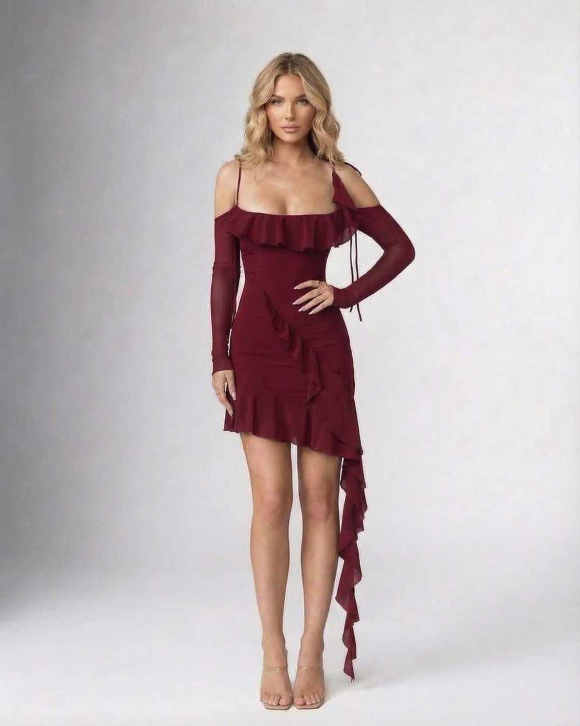Marina Mini Dress by Lauven featuring ruffled asymmetric hem and spaghetti straps in burgundy color.