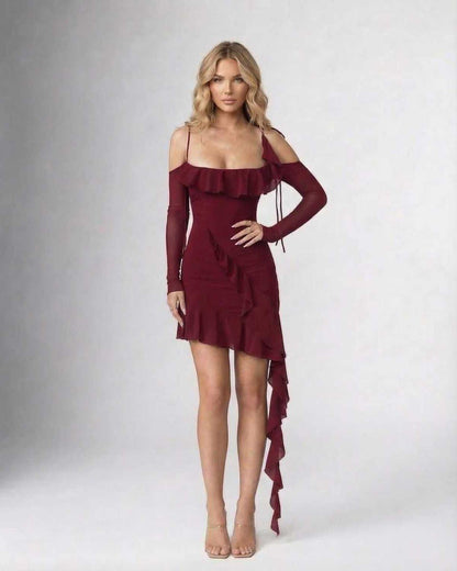 Marina Mini Dress by Lauven featuring ruffled asymmetric hem and spaghetti straps in burgundy color.