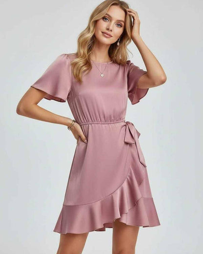 Lauven Marina Mini Dress with elegant ruffle detailing and tie waist, perfect for spring and summer styling.