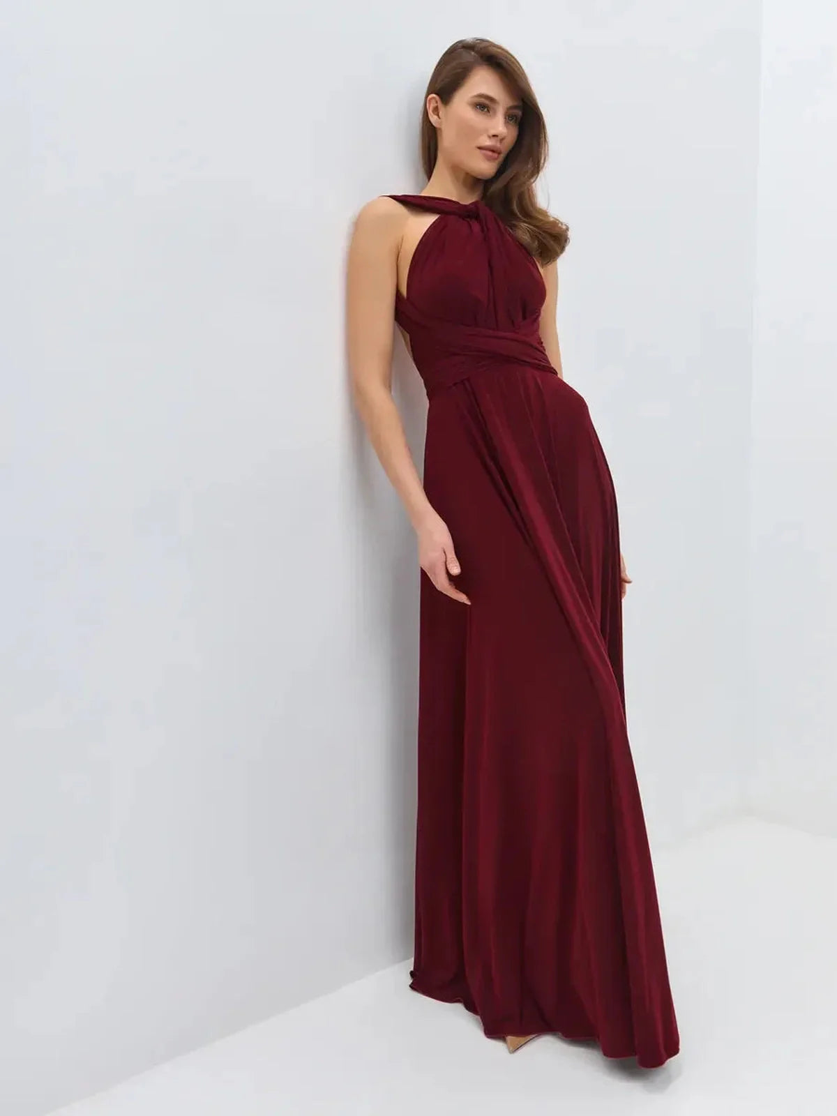 Maxi Dress Bordeaux Muse on model, showcasing backless design and elegant draping in rich wine color.