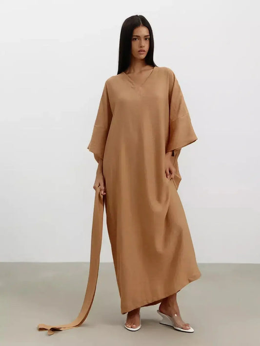 Maxi Dress Dune Whisper in sandstone hue, showcasing a relaxed fit and kimono sleeves, perfect for modern minimalism.
