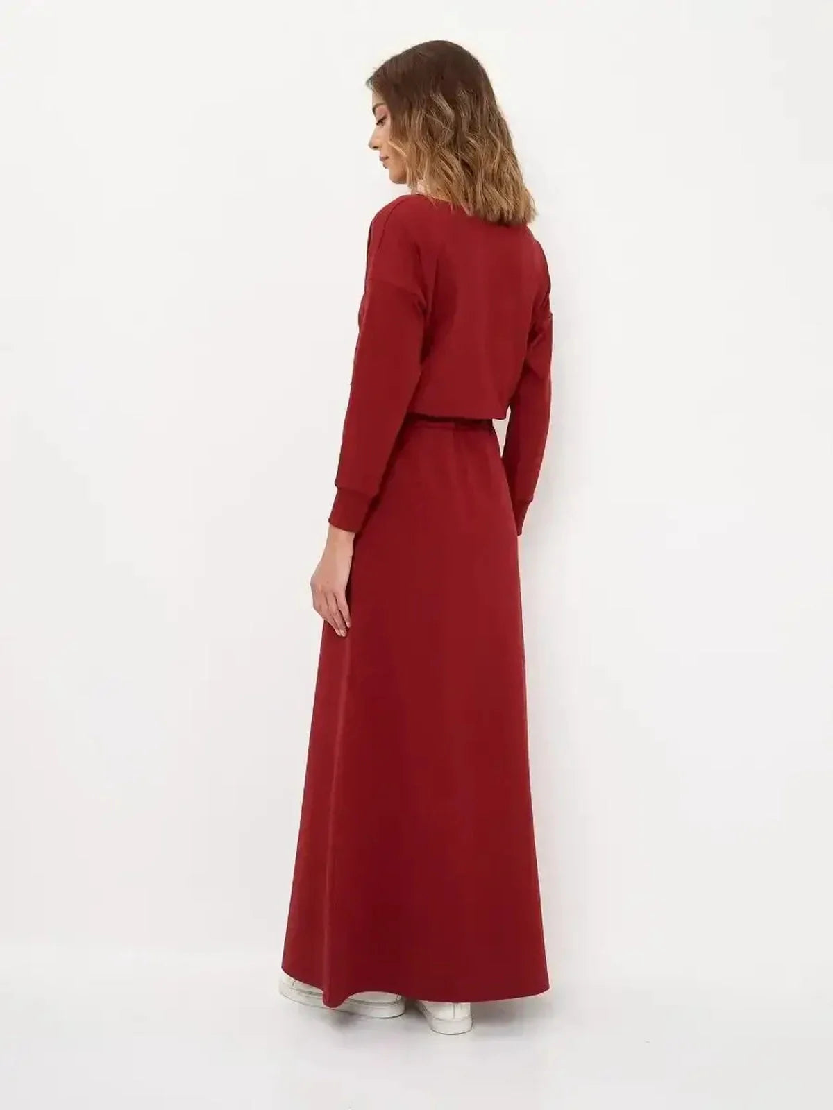 Back view of the elegant red maxi dress with long sleeves and drawstring waist, perfect for formal occasions or casual wear.
