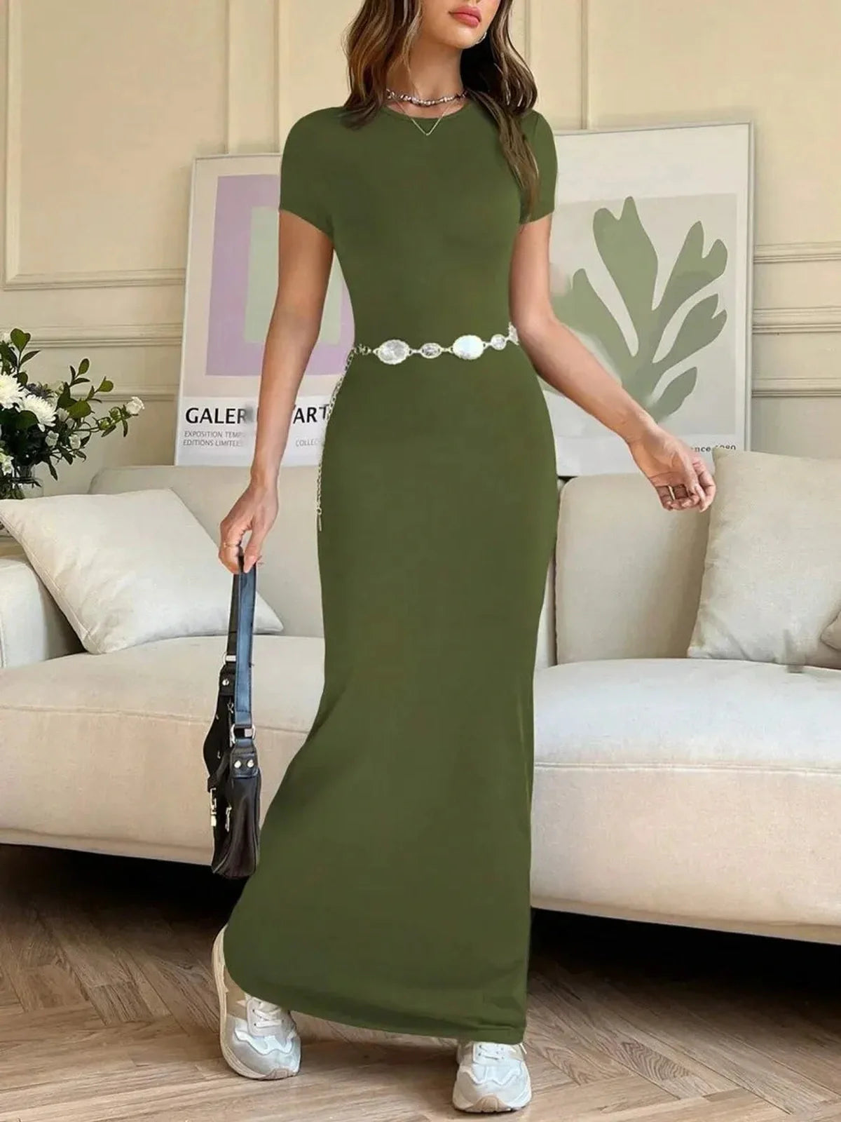 Form-fitting olive green maxi dress with a sculpting silhouette, perfect for casual elegance and chic outings.