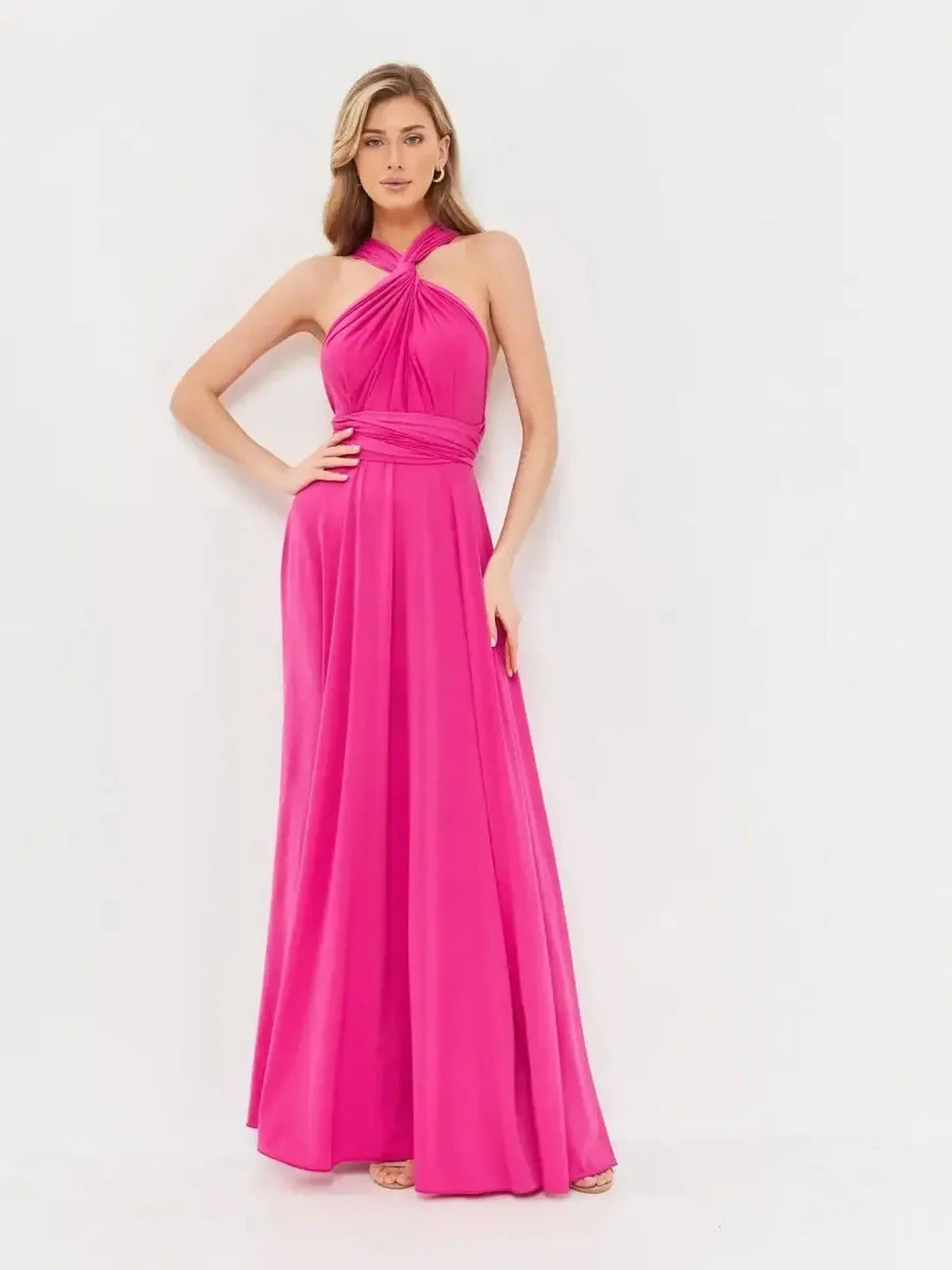 Maxi Dress Lush Twist in vibrant fuchsia pink, featuring a draped halter neck and adjustable wrap fit, ideal for special occasions.