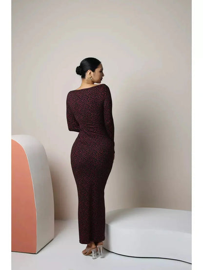 Maxi Dress - Noir Amour: Stylish long sleeve bodycon dress showcasing a fitted silhouette with heart print, perfect for elegant occasions.
