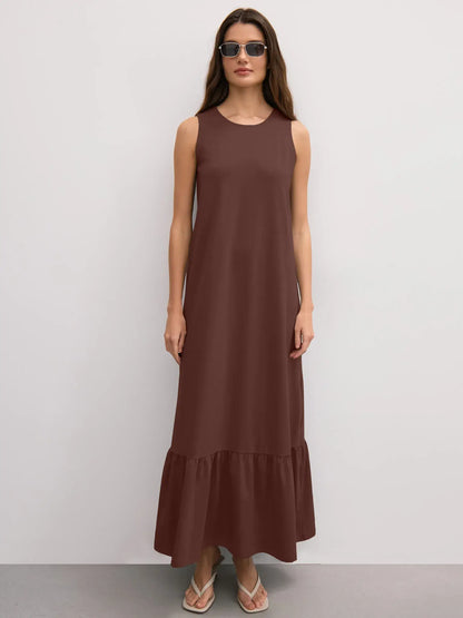 Maxi Dress Reverie in chocolate brown, sleeveless with ruffle hem, ideal for off-duty elegance and comfort.