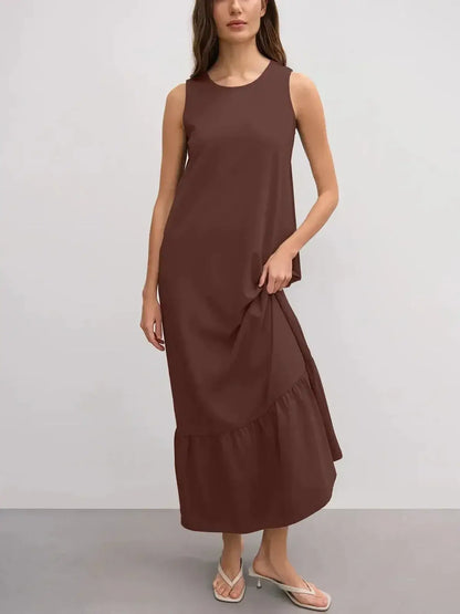 Maxi Dress Reverie in chocolate, sleeveless design with ruffle hem, perfect for an elegant off-duty look.