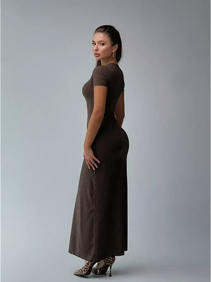 Maxi Dress Sculpted Ease in ribbed knit, showcasing a body-hugging silhouette, perfect for summer and formal occasions.