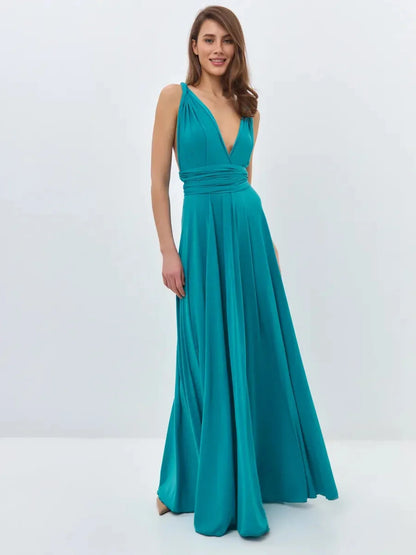Elegant mint green maxi dress with a V-neckline and convertible tie straps, perfect for summer events.