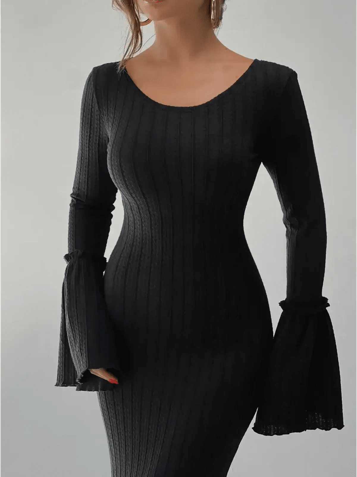 Meridian Maxi Dress featuring a sculpted fit, long sleeves, and flared cuffs in a sleek black ribbed knit design.