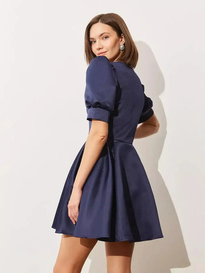 Elegant Midnight Bloom Mini Dress with puff sleeves and satin finish, perfect for weddings and special occasions.