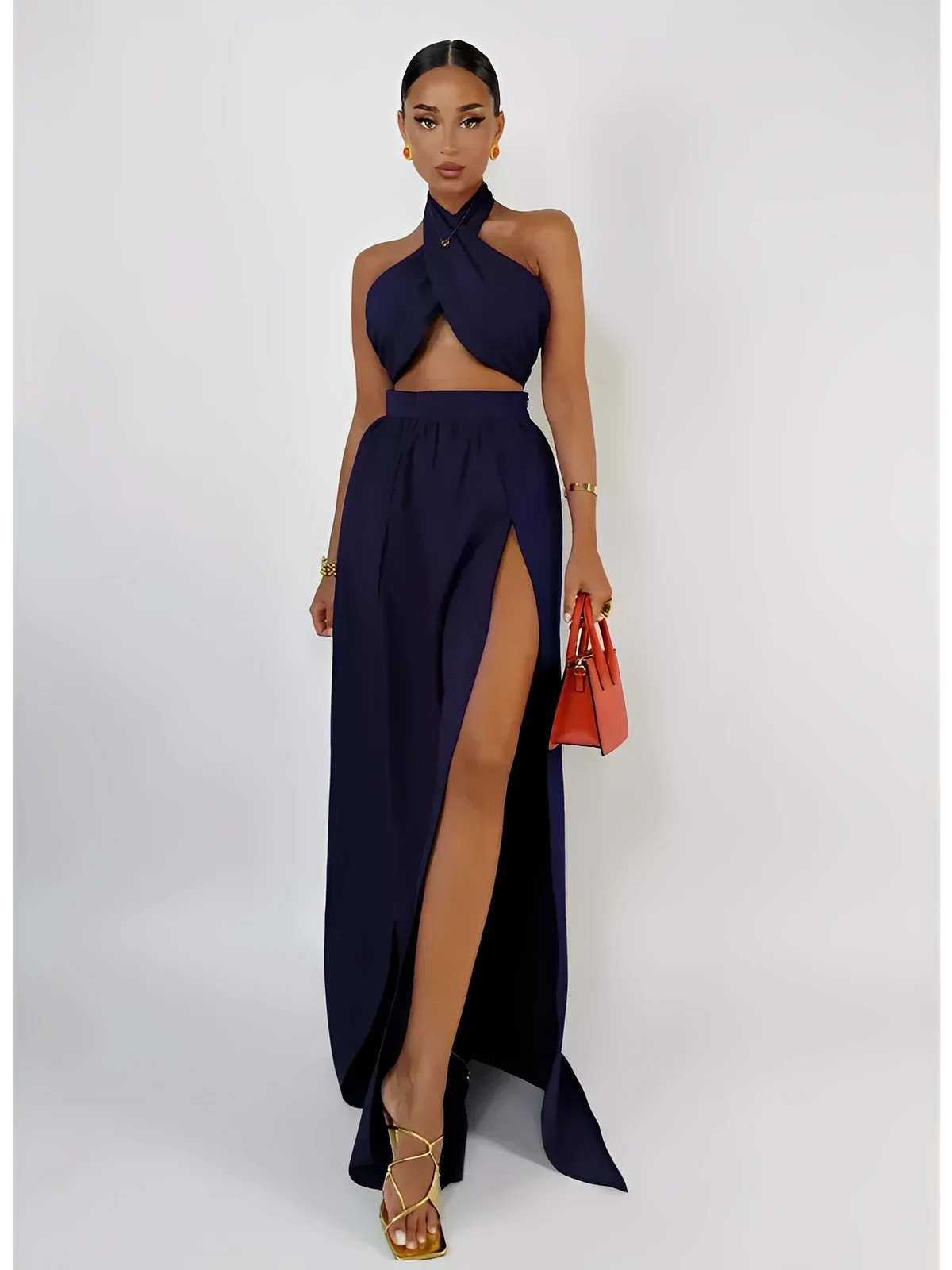 Midnight Halo Set featuring a cutout crop top and high slit maxi skirt, perfect for summer nights and elegant dinners.