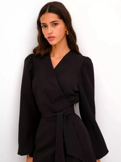 Black midi dress with a flattering V-neckline and wrap silhouette, perfect for formal occasions and summer events.