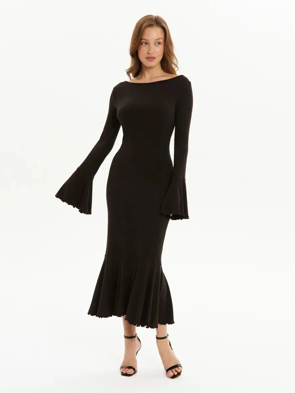 Elegant black midi dress with bell sleeves and a flared hemline, perfect for weddings and evening events.