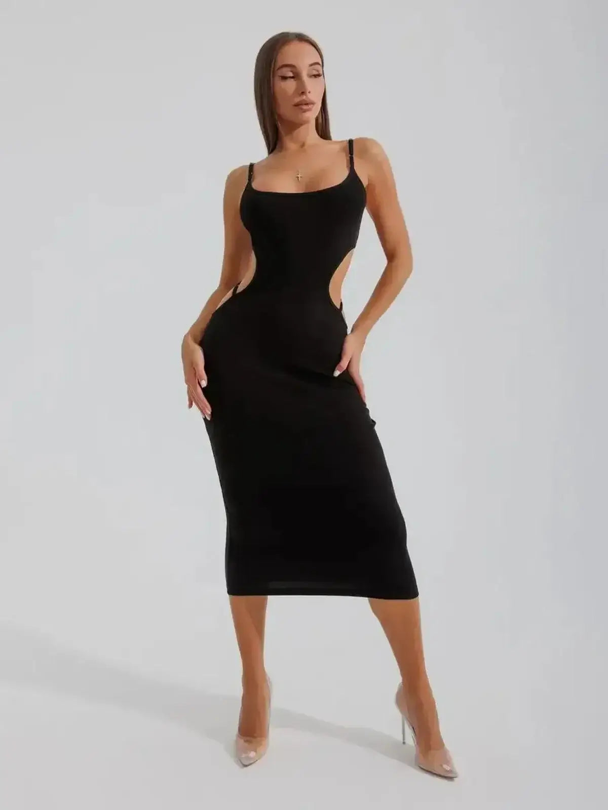 Midnight Silhouette Midi Dress by Lauven featuring sensual cutouts and a sculpted fit.