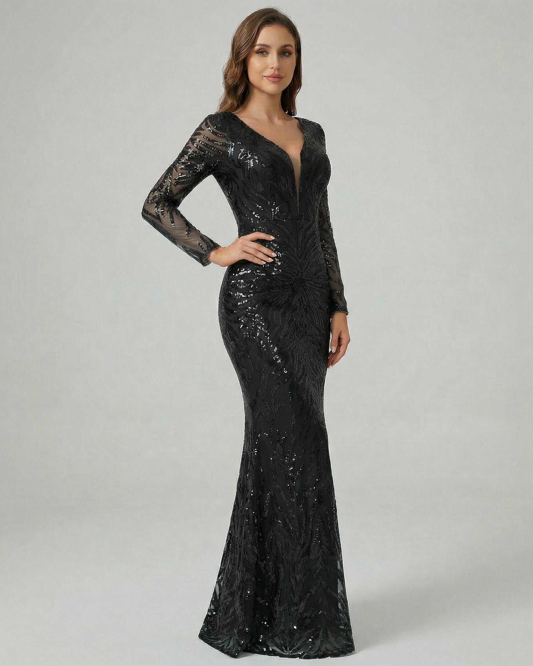 Milano Maxi Dress by Lauven – Black sequin maxi dress with V-neck and long sheer sleeves.