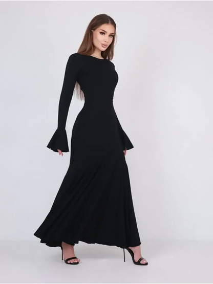 Elegant black Mirage Maxi Dress featuring flared cuffs and fishtail hem, ideal for formal events.