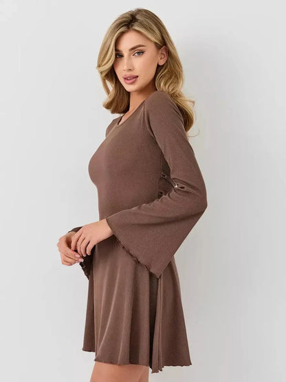 Model showcasing Mocha Flare mini dress by Lauven, featuring bell sleeves and a U-neckline.