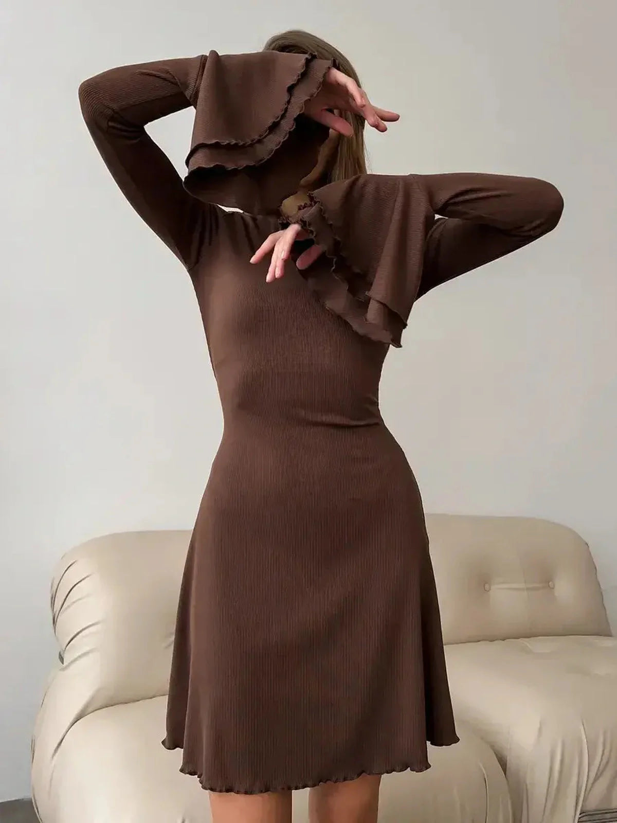 Mocha Flare Mini long sleeve dress with flared hem and layered bell sleeves, perfect for wedding guest or cocktail occasions.