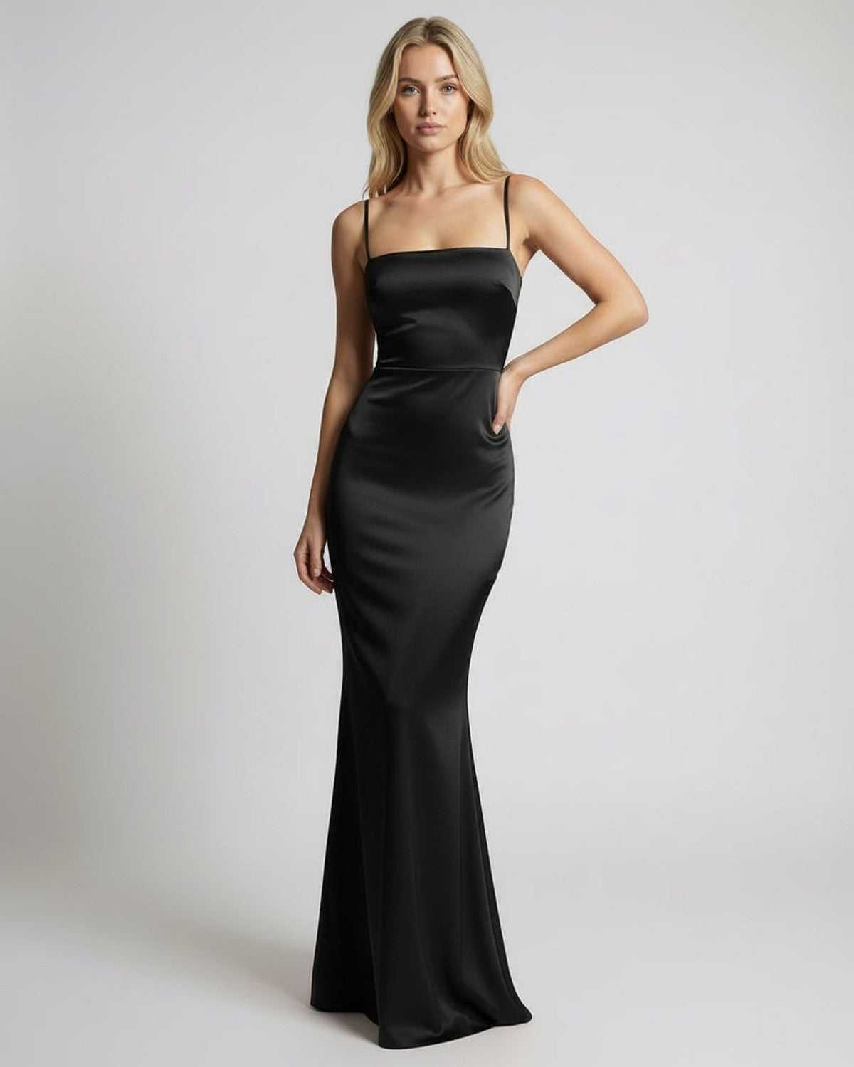 Monaco Maxi Dress featuring black satin fabric, spaghetti straps, and a sleek design by Lauven.