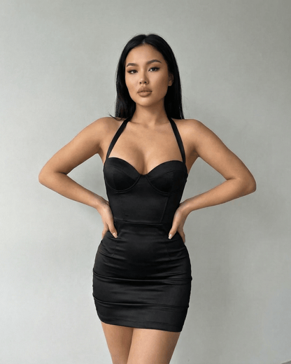 Model wearing Lauven Monaco Mini Dress – Black Satin Bodycon Halter Cocktail Mini Dress with sculpted cup detailing.