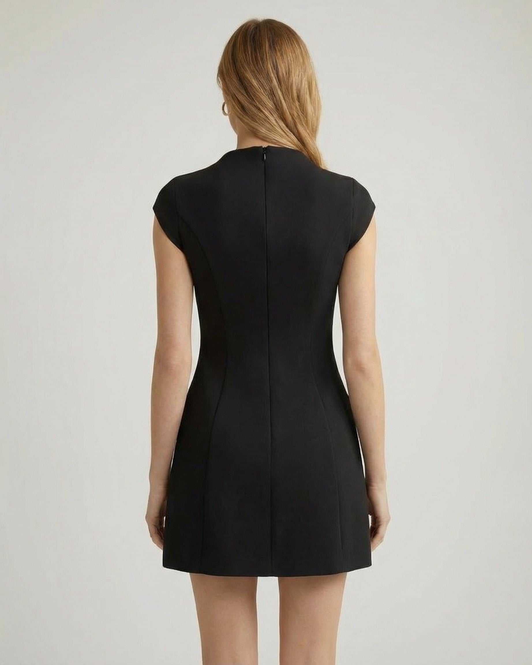 Back view of the Monaco Mini Dress by Lauven, featuring structured A-line silhouette and cap sleeves.