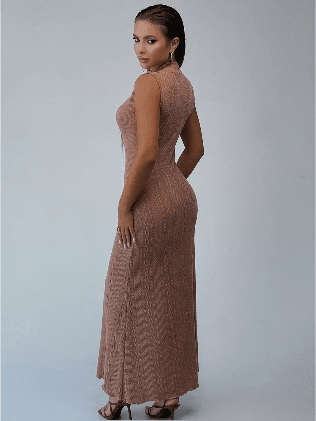 Back view of Museline Maxi Dress in cocoa jacquard, showcasing its sleek bodycon fit and modern stand collar.
