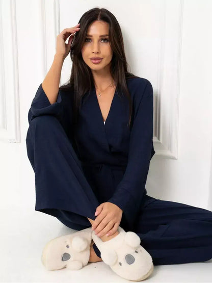 Model wearing a Navy Suit Set by Lauven, showcasing the classic oversized two-piece design in deep blue.