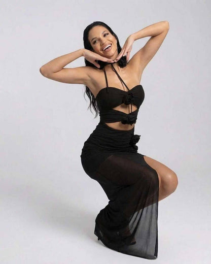 Nerina Maxi Dress by Lauven, elegant black halter neck dress with cutout silhouette and high stretch fabric.