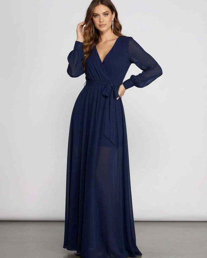 Noctra Maxi Dress in deep navy chiffon, featuring a wrap front V-neckline and long sleeves by Lauven.