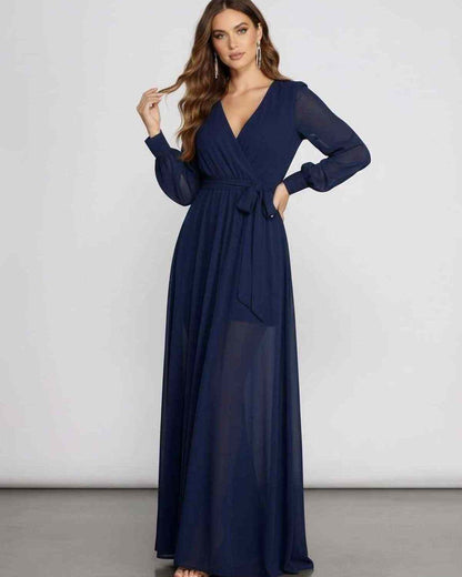 Noctra Maxi Dress - Long sleeve navy chiffon dress with wrap front V-neckline and elegant A-line silhouette by Lauven.