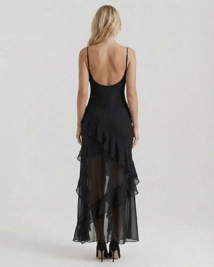 Nocturne Maxi Dress featuring sheer ruffle hem and elegant silhouette, designed by Lauven for a stunning evening look.
