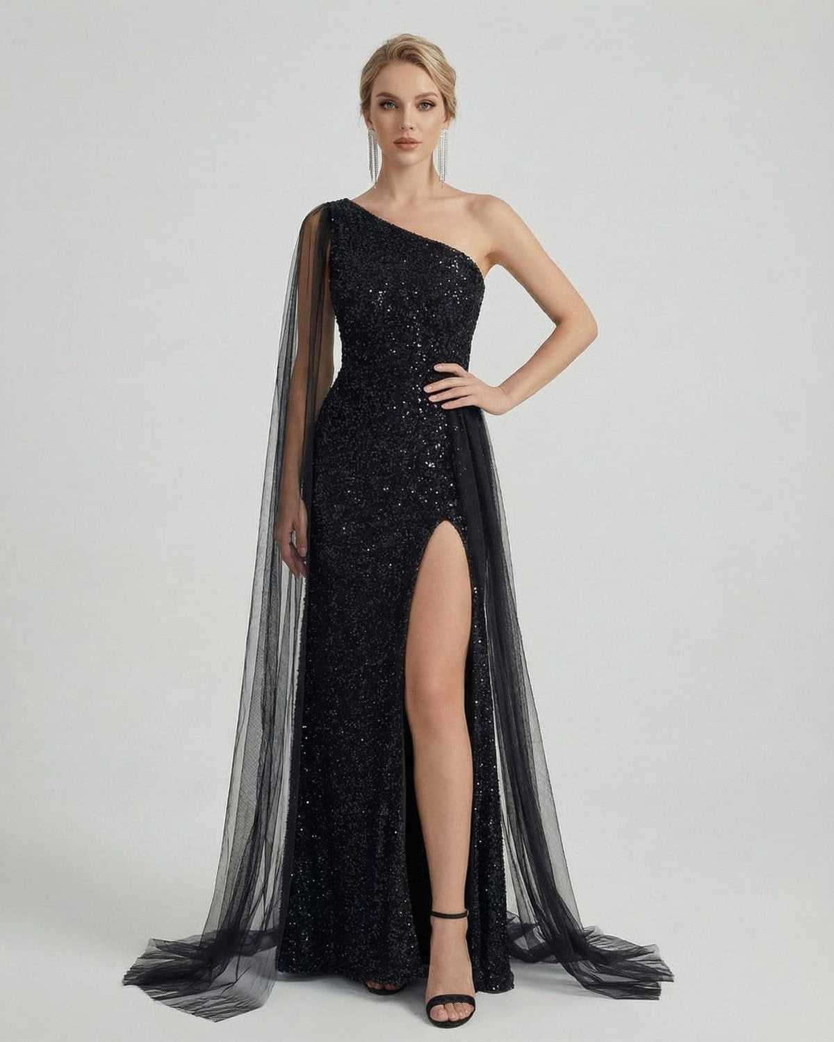 Nocturne Maxi Dress by Lauven – One shoulder sequin black dress with sheer mesh drape and side slit.