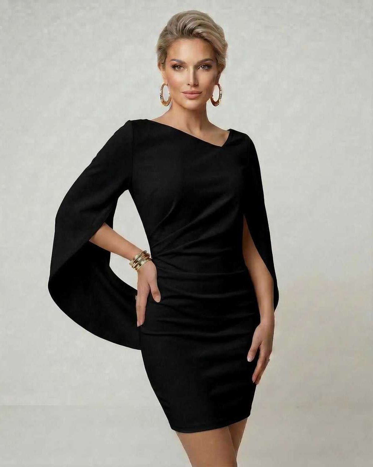 Noella Mini Dress by Lauven featuring a black sheath silhouette with cloak sleeves and an asymmetric O-neckline.