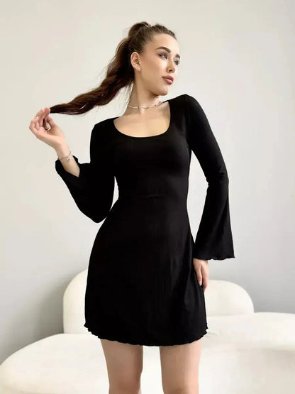 Noir Flare black mini dress with deep square neckline and flared long sleeves, perfect for formal or cocktail events.