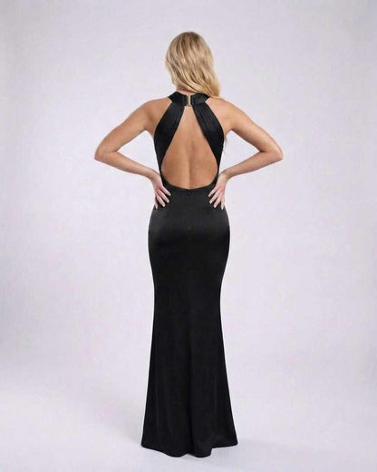 Noir Maxi Dress showcasing its elegant open back design, crafted from black satin by Lauven, perfect for formal occasions.