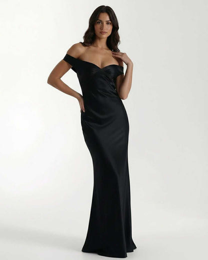Noir Maxi Dress by Lauven, black satin gown with off-shoulder elegance, sleek floor-length silhouette.