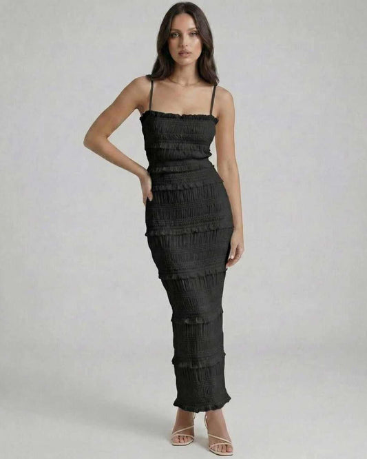 Lauven Noir Maxi Dress showcasing an elegant sheath silhouette with textured pleats and subtle ruffles in classic black.