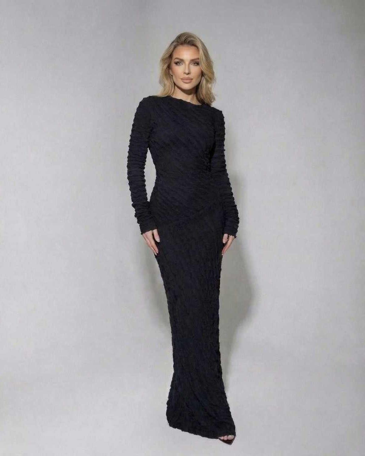 Noir Maxi Dress by Lauven - Textured black long sleeve knitted dress showcasing a flattering silhouette.