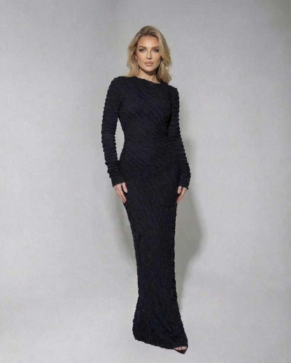 Noir Maxi Dress by Lauven - Textured black long sleeve knitted dress showcasing a flattering silhouette.