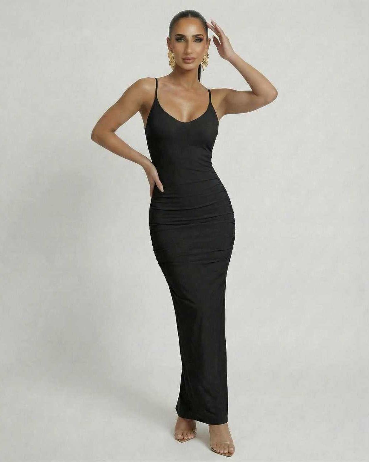 Noir Maxi Dress by Lauven, sleek black sleeveless bodycon design with spaghetti straps and a deep backless cut.