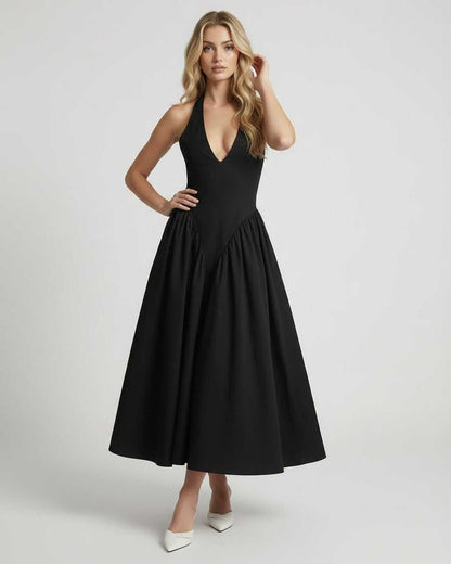 Noir Midi Dress: Black halter neck, backless, elegant silhouette by Lauven, perfect for sophisticated women's fashion.