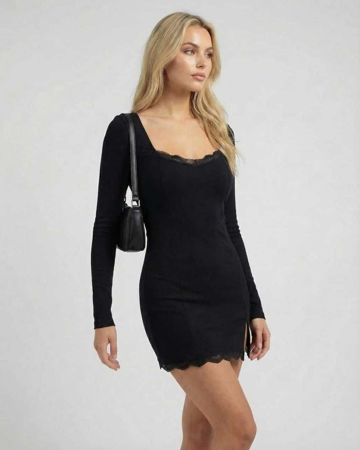 Noir Mini Dress by Lauven features black long sleeves, lace trim, a square neck, and a smooth silhouette.