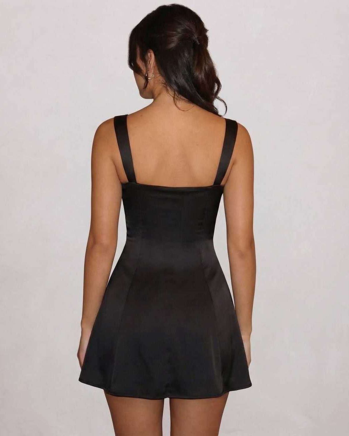 Noir Mini Dress back view, black satin with lace detail, sleek and stylish by Lauven, perfect for modern elegance.