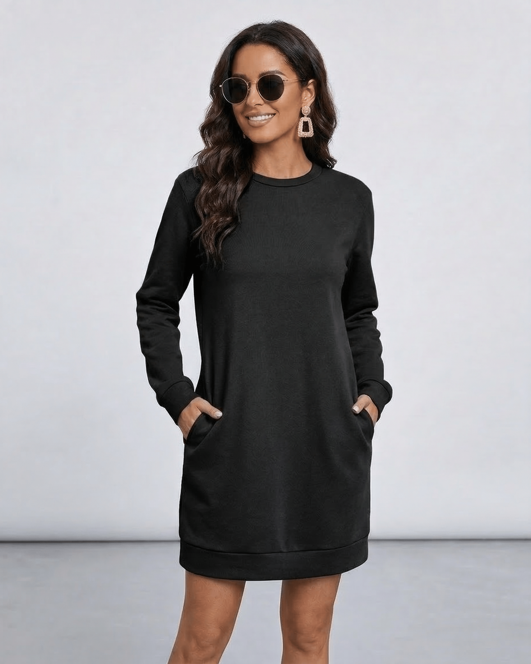Noir Mini Dress by Lauven, a casual black sweatshirt dress featuring pockets and a contemporary design.