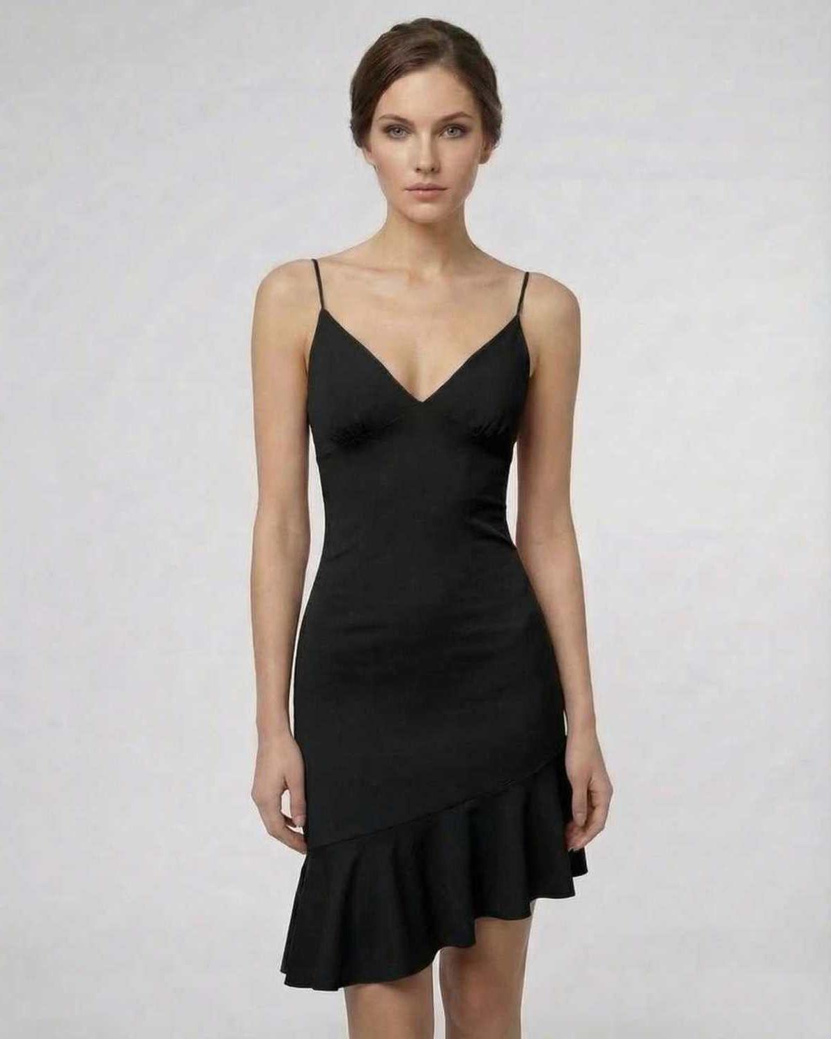 Noir Mini Dress by Lauven, featuring a sleek black A-line silhouette and ruffle detail for an elegant look.