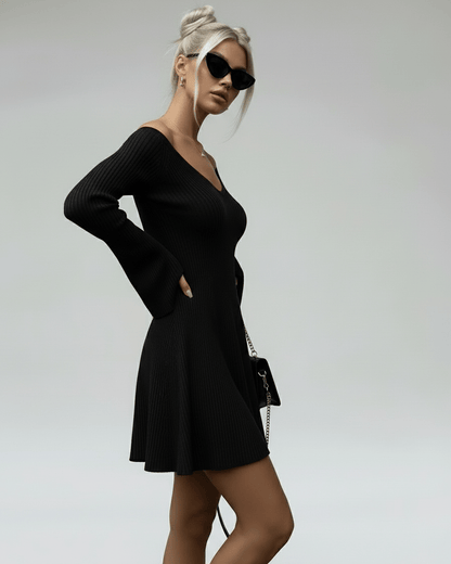 Noir Mini Dress by Lauven, slim fit black knit with V-neck and long flared sleeves for an elegant silhouette.